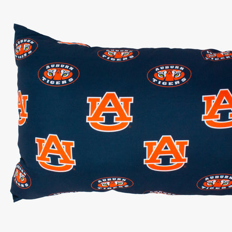 Blue body pillow with Auburn Tigers logos on a white background