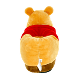 Pair of Winnie the Pooh slippers in soft yellow plush with rounded ears
